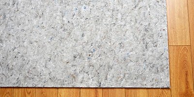 Rug pad on the wooden floor
