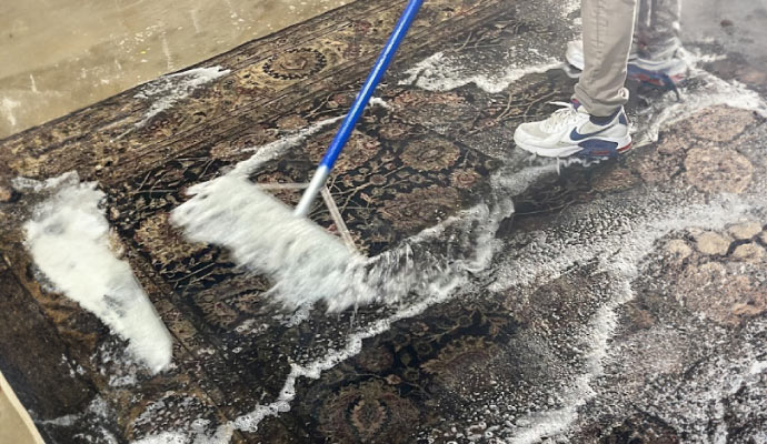 Rug cleaning using equipment